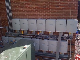 Example 1: These inverters (U.S. version) will have a reduced output over time because they are installed too close together. Example 1: These inverters (U.S. version) will have a reduced output over time because they are installed too close together.
